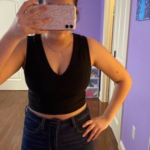 Black cropped tank with gold zipper detail